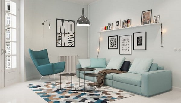 Bộ sofa mang màu xanh pastel làm điểm nhấn cho căn phòng